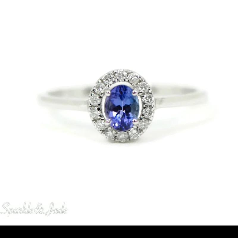 Beautiful Birthstone Rings For Personalized Fashion-14k White Gold Oval Genuine Tanzanite and Diamond Halo Ring