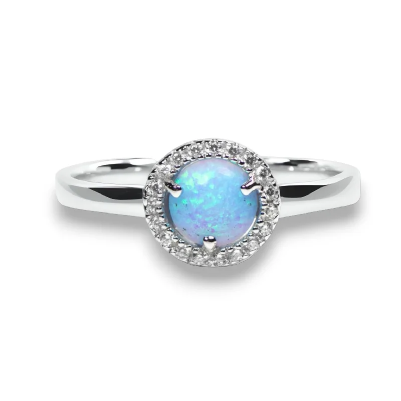 Elegant Sapphire Rings For Luxury Appeal-Sterling Silver Light Blue Opal and CZ Halo Ring